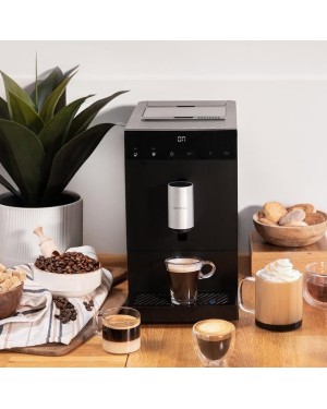 Cafetera superautomática prepara espressos y americanos de café en grano recién molido.